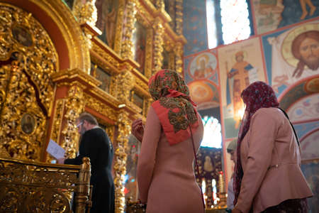 03.10.2020 Russia Moscow Church of the Kazan Icon of the Mother of God. Priest and worshipers....