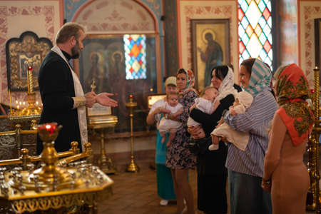 03.10.2020 Russia Moscow Church of the Kazan Icon of the Mother of God. Baptism ritual in the Orthodox Churchのeditorial素材