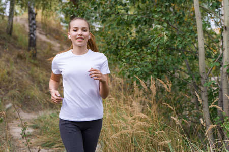 Young woman jogging in the park