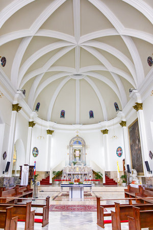 30.06.2022 SANTO DOMINGO, DOMINICAN REPUBLIC The interior of a Catholic church.のeditorial素材