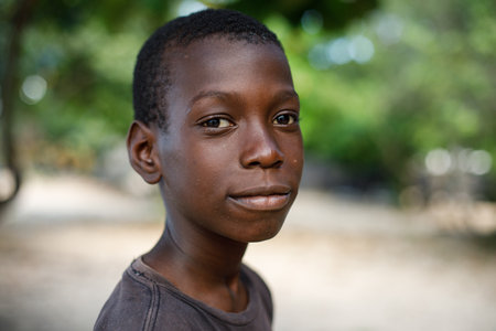 12.09.2022 Dominican Republic Macao. Portrait of an African American boy. Slums.のeditorial素材
