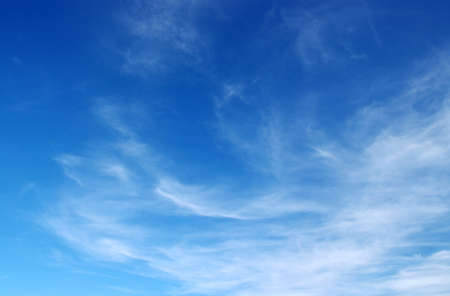 blue sky background with white cloudsの写真素材