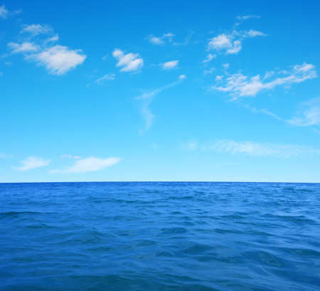 Blue sea water surface on skyの写真素材