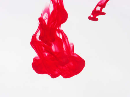 ink in water on a white background の写真素材