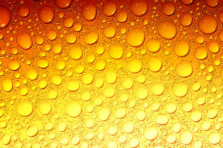 water drops on beer backgroundの写真素材