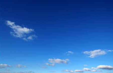 background of blue sky and white cloudsの写真素材