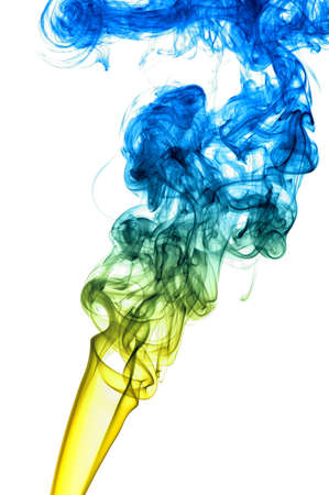 colored smoke isolated on white backgroundの写真素材