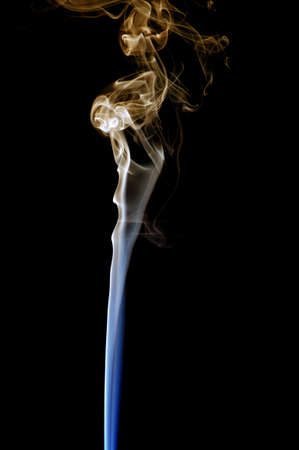 colored smoke isolated on white backgroundの写真素材