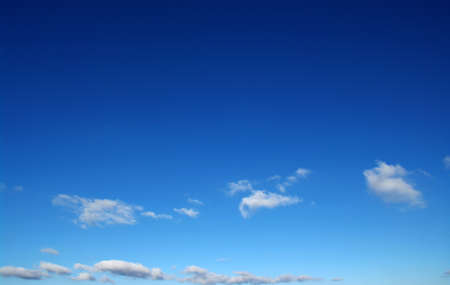background of blue sky and white cloudsの写真素材