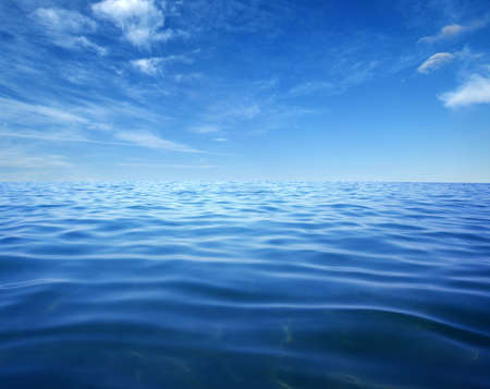Blue sea water surface on skyの写真素材