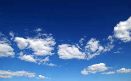 background of blue sky and white cloudsの写真素材