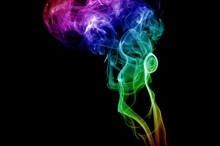 colored smoke isolated on white backgroundの写真素材