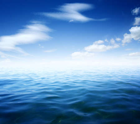 Blue sea water surface on skyの写真素材