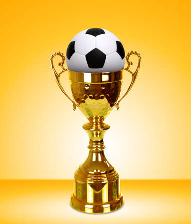 Gold Cup on light backgroundの写真素材
