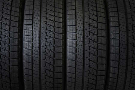 Winter tires close-up . Tyre backgroundの写真素材