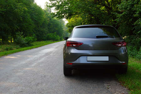 Silver car and on the roadの写真素材