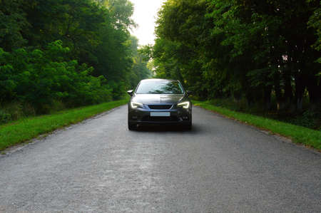 Silver car and on the roadの写真素材