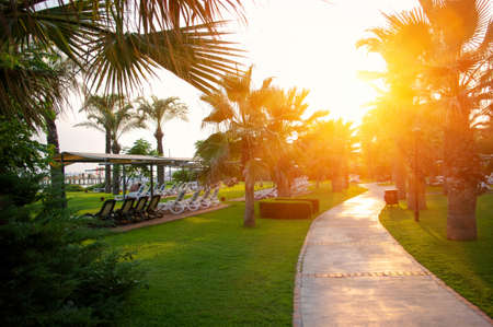 Beautiful sunset at a beach resort in hotelの写真素材