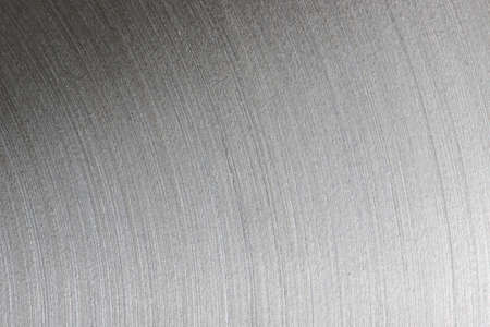 Brushed steel plate texture with reflectionsの写真素材