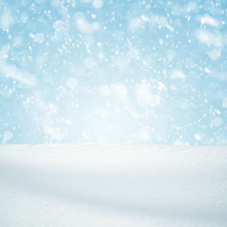 Winter background, falling snow over winter landscape with copy space