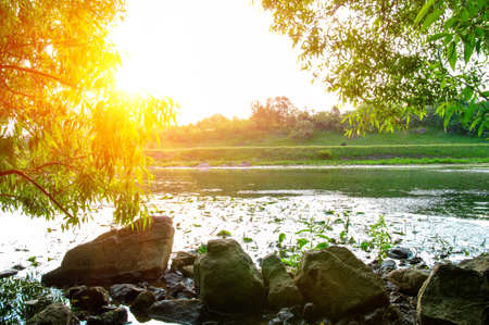 landscape with the river on sunの写真素材