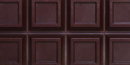 dark chocolate bar as background