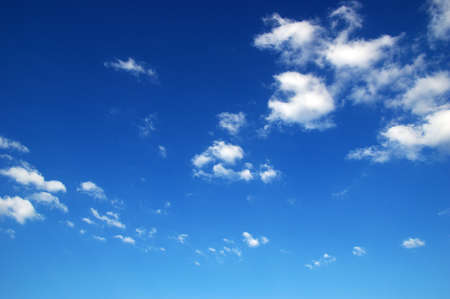 sky background and white cloudsの写真素材