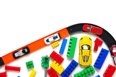 Toy car and racing track isolated on the white background