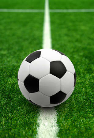 Soccer ball on the football fieldの写真素材