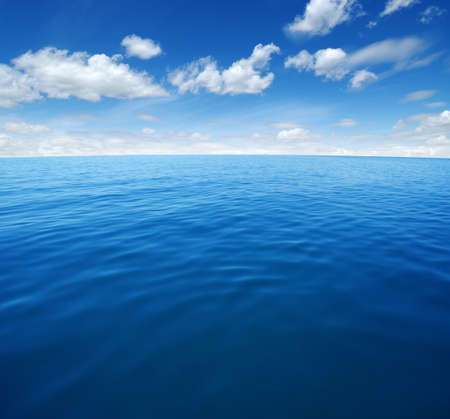 Blue sea water surface on skyの写真素材
