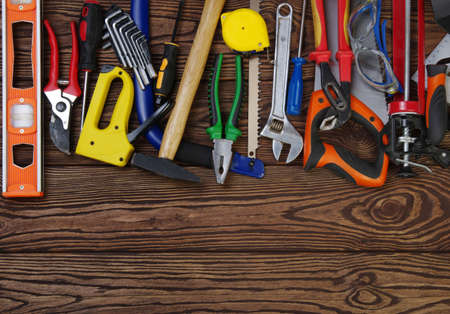 Tools on wood  background . Top view.の写真素材
