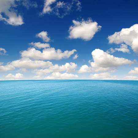 Blue sea water surface on skyの写真素材