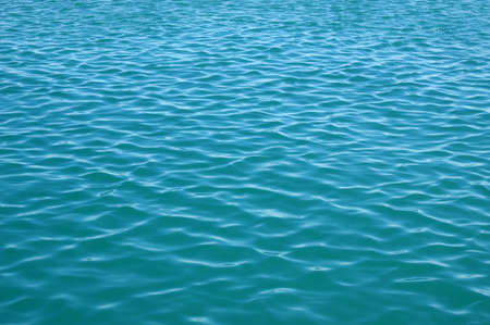Blue sea surface with waves . Water background.の写真素材