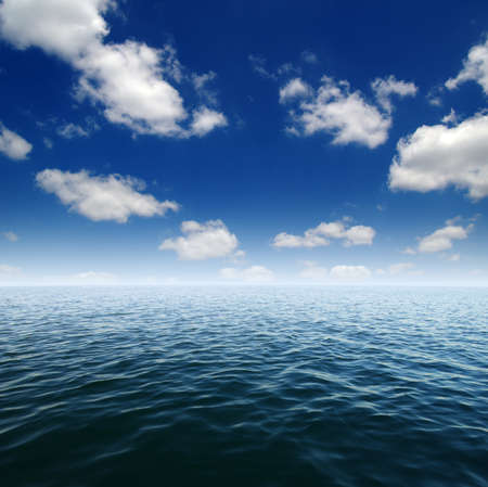 Blue sea water surface on skyの写真素材