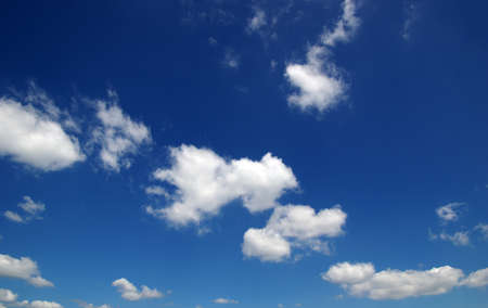 sky background and white cloudsの写真素材