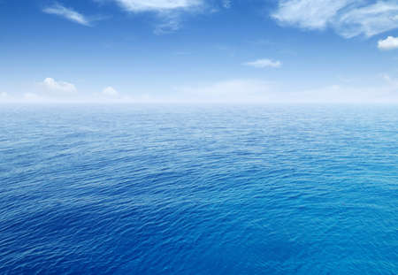 Seascape and cloudy blue skyの写真素材