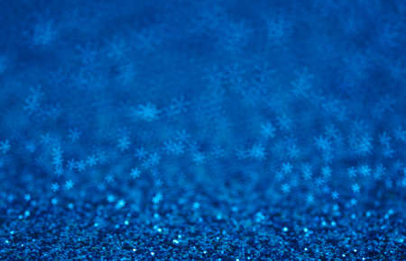 Happy holidays background with blue snowflakes.の写真素材