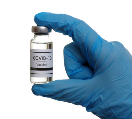 vaccine in doctor`s hand isolated on a white .の写真素材