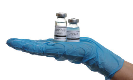 vaccine in doctor`s hand isolated on a white background.の写真素材