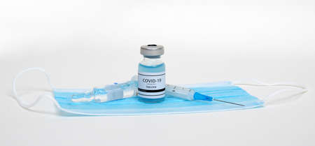 Vaccine bottles, vials medicine and syringe injection  isolated on white. Vaccination, immunization, treatment to infection.の写真素材