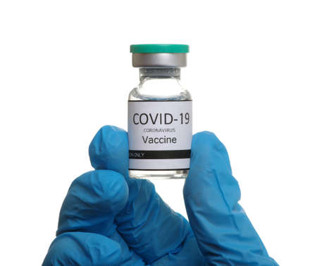vaccine in doctor`s hand isolated on a white background.の写真素材