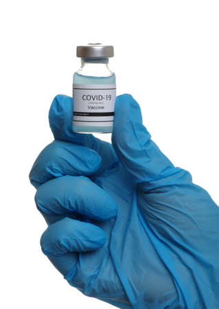 vaccine in doctor`s hand isolated on a white background.の写真素材