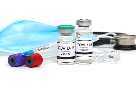 Vaccine bottles, vials medicine and syringe injection  isolated on white.の写真素材