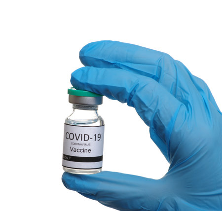 vaccine in doctor`s hand isolated on a white background.の写真素材