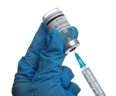 vaccine in glass bottle in  doctor hand isolated on white background.の写真素材