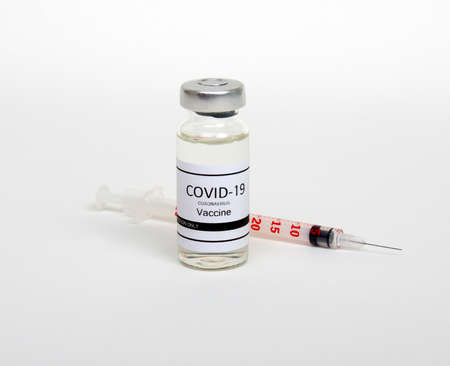Vaccine bottles, vials medicine and syringe injection  isolated on white. Vaccination, immunization, treatment to infection.の写真素材