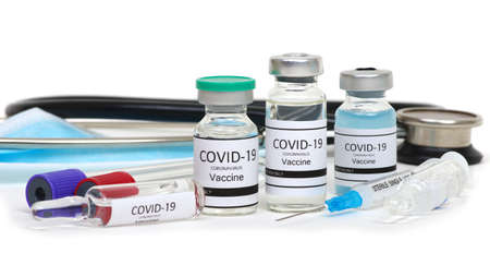 Vaccine bottles, vials medicine and syringe injection  isolated on white. Vaccination, immunization, treatment to infection.の写真素材