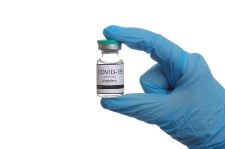 vaccine in doctor`s hand isolated on a white background.の写真素材