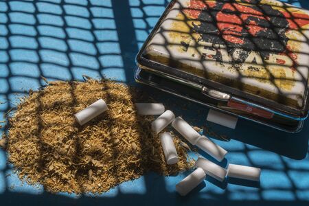 Tobacco with cigarette filters and cigarette caseの写真素材
