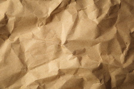brown crumpled paper texture, old paper surface for background.の写真素材